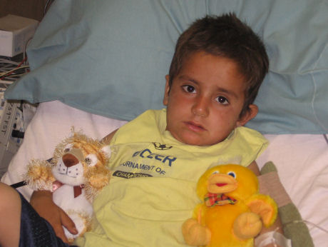 Little boy hit by shrapnel